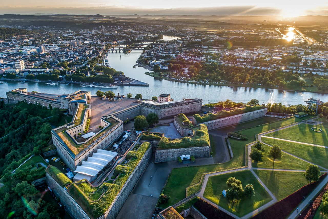 Aerial View of Ehrenbreitstein fortress and Koblenz City in Germany during sunset.